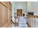 Grand foyer featuring high ceilings, carpeted stairs, and wooden accents throughout at 916 W Alder St, Louisville, CO 80027