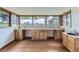 Wet bar with hardwood floors, light cabinets, and great natural light at 916 W Alder St, Louisville, CO 80027