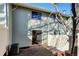 Fenced back yard with a wood deck and sliding glass door at 2030 Gyros Cir # 155, Lafayette, CO 80026