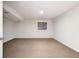 Empty bedroom featuring neutral carpet, one window, and white walls at 2030 Gyros Cir # 155, Lafayette, CO 80026