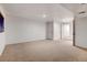 Spacious empty bedroom with neutral carpet, white walls, and good lighting at 2030 Gyros Cir # 155, Lafayette, CO 80026