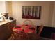 Dining area with wooden table set for four at 2030 Gyros Cir # 155, Lafayette, CO 80026