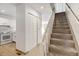 Entryway with carpeted stairs, access to kitchen at 2030 Gyros Cir # 155, Lafayette, CO 80026