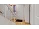 Entryway features tile floors, coat hooks, and stairway at 2030 Gyros Cir # 155, Lafayette, CO 80026
