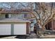 Charming multi-story home with a garage, brick accents, and a mature shade tree at 2030 Gyros Cir # 155, Lafayette, CO 80026