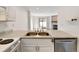 Kitchen sink and view of open floor plan at 2030 Gyros Cir # 155, Lafayette, CO 80026
