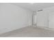 Bedroom with neutral carpet, a ceiling light, and a closet; simple and bright at 5926 S Elkhart Ct, Centennial, CO 80016