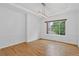 Bright living room with hardwood floors and large window overlooking yard at 5926 S Elkhart Ct, Centennial, CO 80016