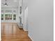 Bright living room with hardwood floors, a modern fireplace, and many windows at 5926 S Elkhart Ct, Centennial, CO 80016