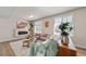 Inviting living room featuring a fireplace, stylish furniture, and bright windows at 22072 E 38Th Pl, Aurora, CO 80019