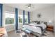 Tranquil bedroom with large windows, cozy bed, and stylish decor at 5735 Boston St, Denver, CO 80238