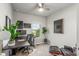 Bright home office features modern decor, natural light, and comfortable seating at 5735 Boston St, Denver, CO 80238