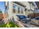 Inviting patio with stylish seating, perfect for outdoor relaxation and entertaining at 5735 Boston St, Denver, CO 80238