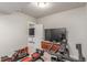 Finished workout room equipped with television, rowing machine, and exercise bike at 5735 Boston St, Denver, CO 80238
