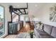 Inviting living room featuring a wet bar and stylish decor at 2599 S Cherokee St, Denver, CO 80223