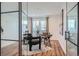Modern office space featuring hardwood floors, glass walls and natural light at 2599 S Cherokee St, Denver, CO 80223