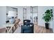 Bright office space with glass wall, modern decor, offering a productive and stylish work environment at 2599 S Cherokee St, Denver, CO 80223