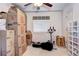Bedroom filled with moving boxes and an exercise bike, ready for your personal touch at 4907 Fenwood Dr, Highlands Ranch, CO 80130