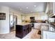 Spacious kitchen with a large island, stainless steel appliances, and ample cabinet space at 4907 Fenwood Dr, Highlands Ranch, CO 80130