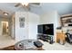 Bright living room with ample natural light and comfortable seating at 4907 Fenwood Dr, Highlands Ranch, CO 80130