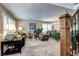 Comfortable living space boasts a seamless blend of living and dining areas, perfect for gatherings at 4907 Fenwood Dr, Highlands Ranch, CO 80130