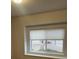 Bedroom with laminate flooring and natural light from the window at 6392 S Hill St, Littleton, CO 80120