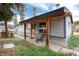 Charming home with a covered porch, rustic wood accents, and inviting curb appeal at 32 Magnum Bonum Dr, Breckenridge, CO 80424
