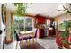 Bright kitchen with stainless steel appliances, dark cabinetry, and mountain views at 32 Magnum Bonum Dr, Breckenridge, CO 80424