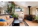 Comfortable living room area with wood-burning fireplace and relaxing seating at 32 Magnum Bonum Dr, Breckenridge, CO 80424