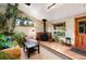 Cozy living room featuring a wood burning fireplace and natural light at 32 Magnum Bonum Dr, Breckenridge, CO 80424