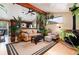 Inviting living room with hardwood floors, wood-burning stove, and a cozy atmosphere at 32 Magnum Bonum Dr, Breckenridge, CO 80424