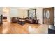Inviting living room boasting hardwood floors and a large window for natural light at 10661 W 104Th Ave, Broomfield, CO 80021