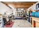 Bright craft space with a work desk, storage shelving, and a concrete floor at 6238 S Cherry Cir, Centennial, CO 80121
