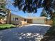 Charming single-Gathering home with brick facade, two-car garage, and a well-maintained front yard at 6238 S Cherry Cir, Centennial, CO 80121