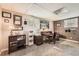 Home office with a window, desk, and built-in storage at 6238 S Cherry Cir, Centennial, CO 80121