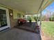 Cozy covered patio featuring outdoor seating, decorative elements, and a relaxing ambiance at 6238 S Cherry Cir, Centennial, CO 80121