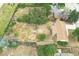Aerial view of expansive backyard showcasing mature trees, lawn and property boundaries at 4559 Ashfield Dr, Boulder, CO 80301