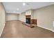 Basement featuring a brick fireplace, adding warmth and character at 4559 Ashfield Dr, Boulder, CO 80301