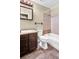 Bathroom featuring a vanity, toilet, and bathtub with tile surround for a functional space at 4559 Ashfield Dr, Boulder, CO 80301