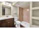 Bathroom with a shower, vanity, and tile surround for a comfortable and stylish space at 4559 Ashfield Dr, Boulder, CO 80301