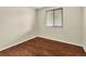 Bedroom showcasing wood-look flooring and a window for natural light and ventilation at 4559 Ashfield Dr, Boulder, CO 80301