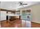 Eat-in kitchen featuring a refrigerator, gas range, ample cabinet space, and a sliding door to the backyard at 4559 Ashfield Dr, Boulder, CO 80301