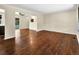 Open-concept living room with hardwood floors and neutral wall colors at 4559 Ashfield Dr, Boulder, CO 80301
