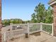 Concrete balcony with white railing overlooking the community at 16366 E Fremont Ave # 11, Aurora, CO 80016