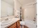 Bathroom featuring vanity, shower and tub with tile surround at 16366 E Fremont Ave # 11, Aurora, CO 80016