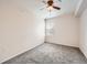 Bright bedroom featuring a ceiling fan and a window offering natural light at 16366 E Fremont Ave # 11, Aurora, CO 80016