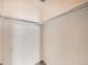 Walk-in closet with chrome racks for hanging and storage at 16366 E Fremont Ave # 11, Aurora, CO 80016