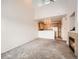 Spacious living room open to the kitchen and featuring a cozy fireplace at 16366 E Fremont Ave # 11, Aurora, CO 80016