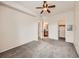 Bedroom featuring an ensuite bathroom and a walk-in closet at 16366 E Fremont Ave # 11, Aurora, CO 80016