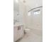 Bright bathroom features a shower-tub combination with white tile and marble floors at 5745 W 91St Ave, Westminster, CO 80031